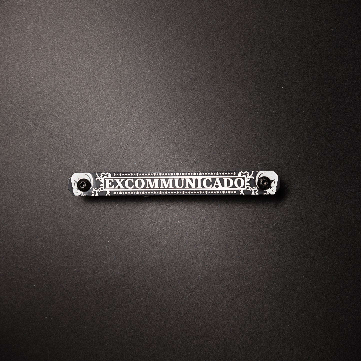 Excommunicado Version 1-Large Tag