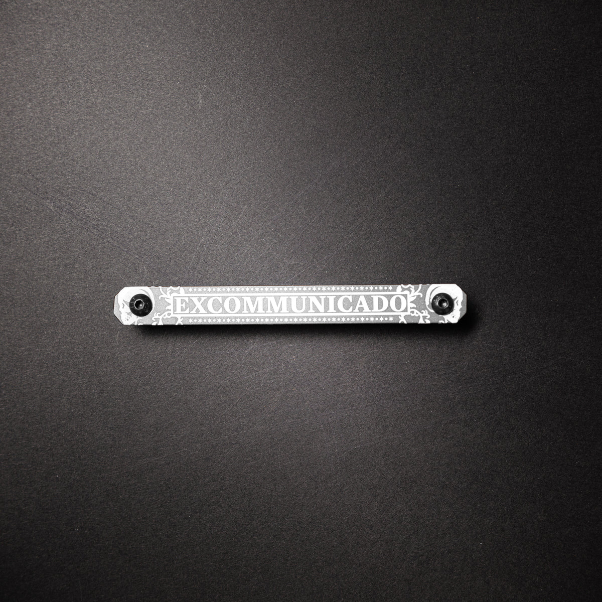 Excommunicado Version 1-Large Tag