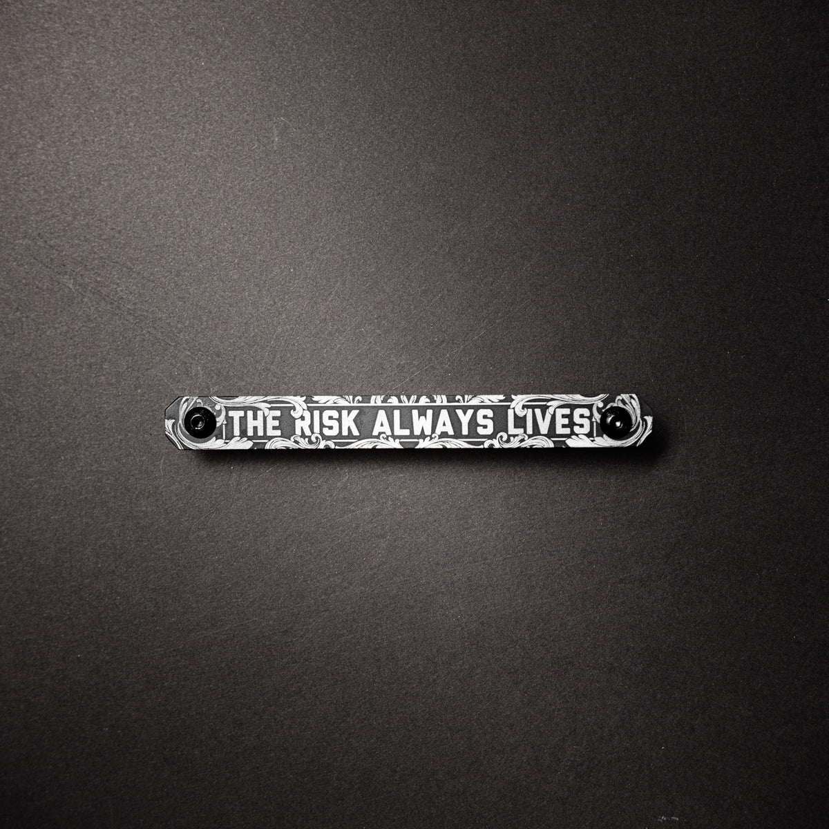 The Risk Always Lives - Large Tag
